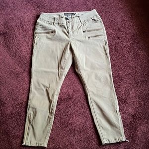 Torrid Olive Green Pants with zipper detail at hip and ankle. Stretchy size 10r